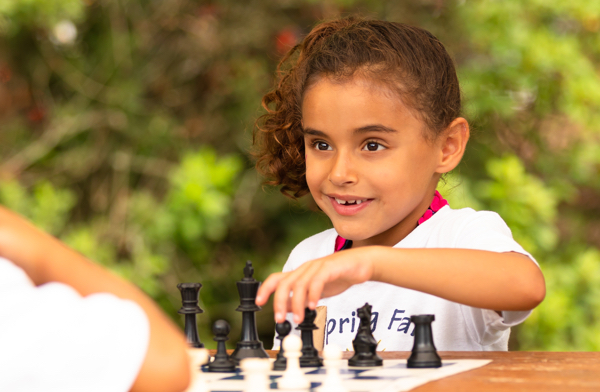 Kids playing chess.