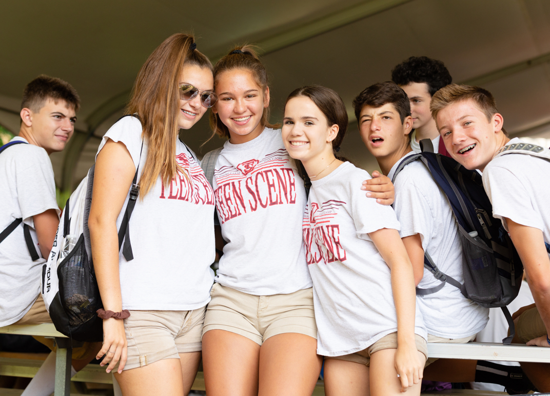 Teenage campers gather for a photo