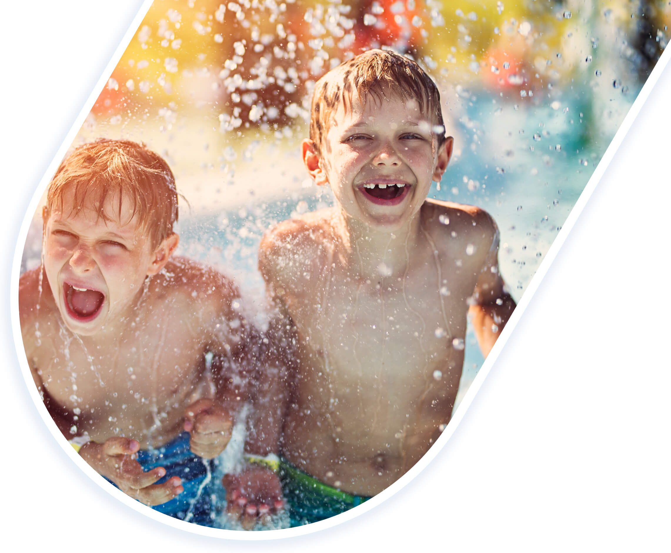 Two boys playing in water.