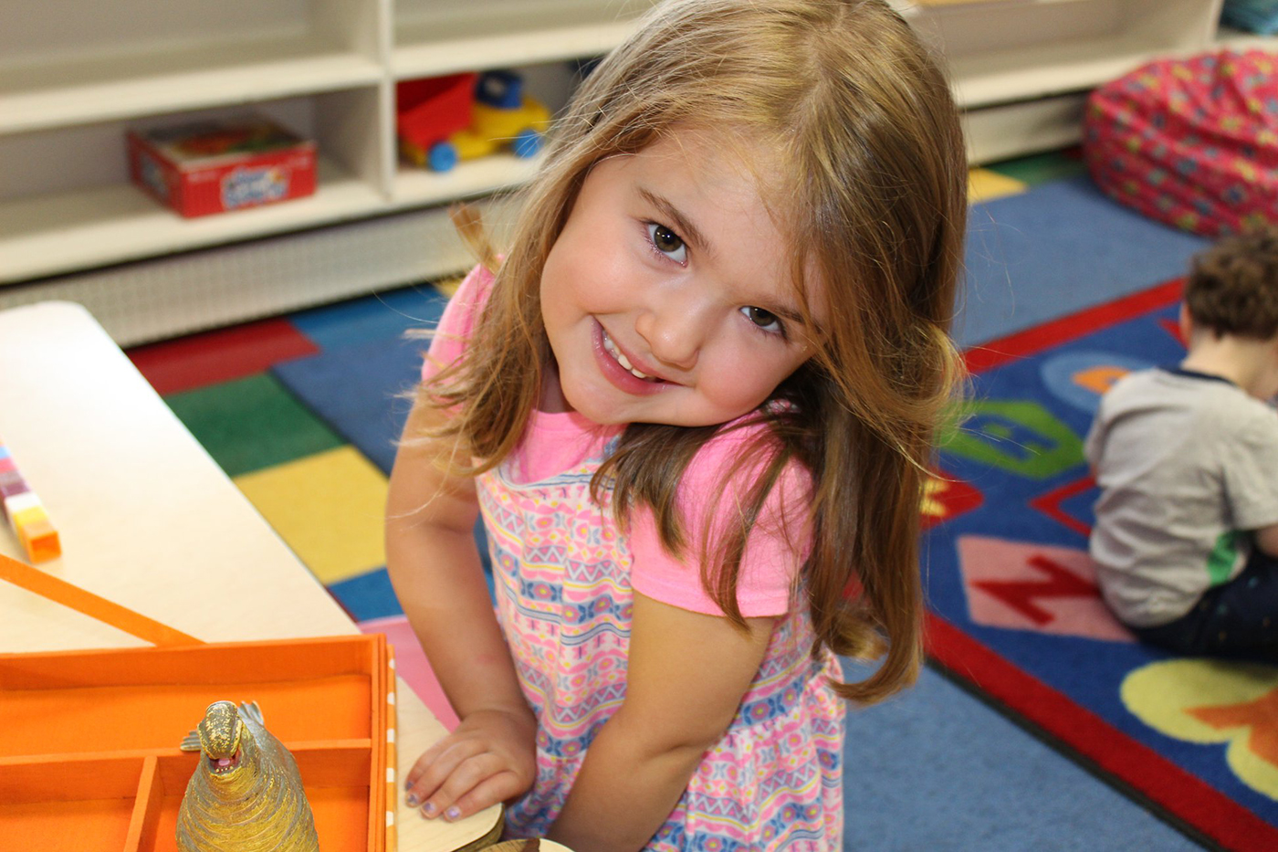 Toddler smiling.