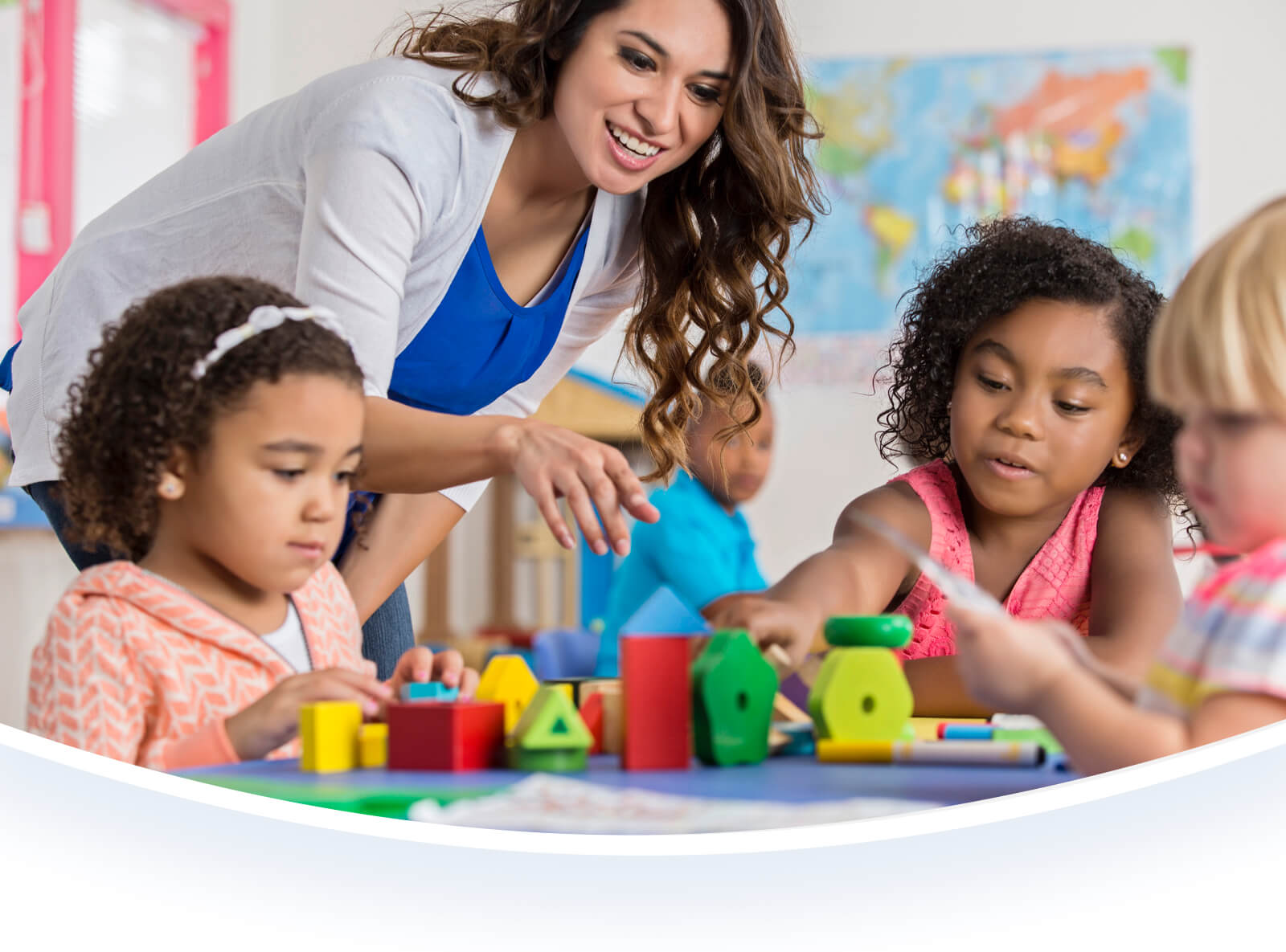 Female teacher helping students