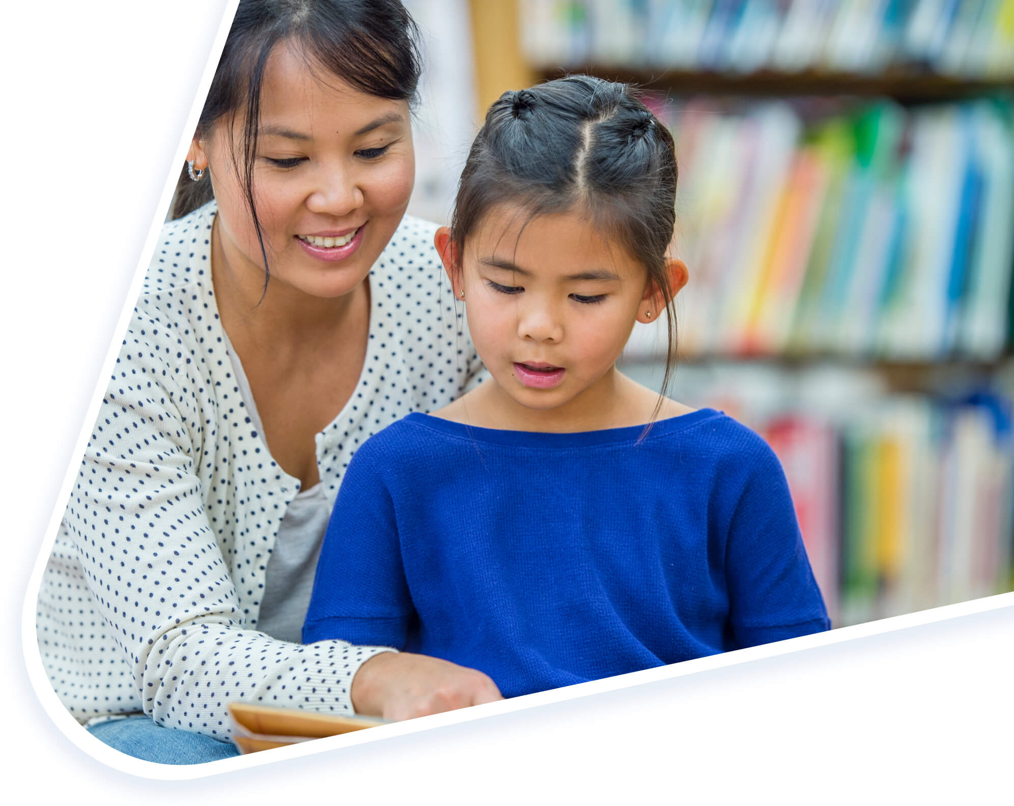 Parent and child in a library.